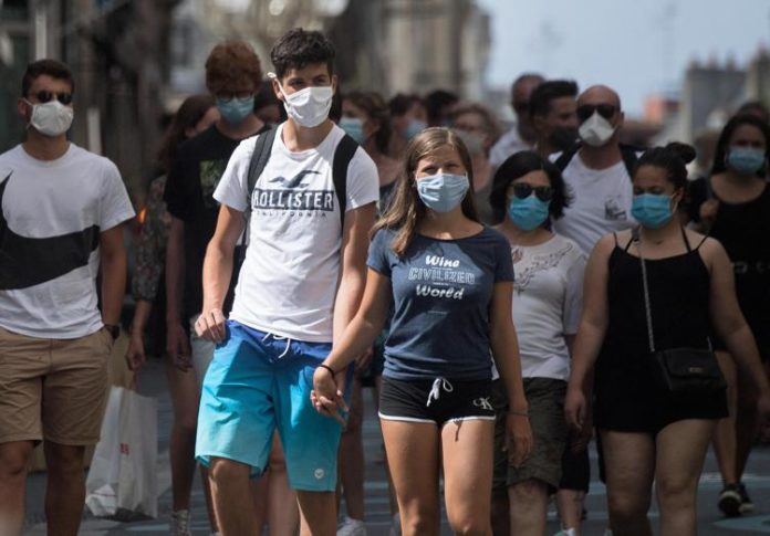 persone_mascherine_virus_afp